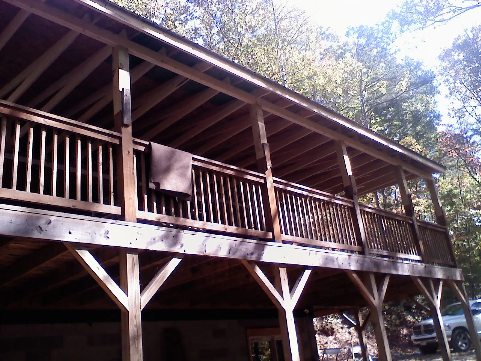 Timber framing under a new elevated porch and deck — Roof Leak Repair in Clairfield by Roofing Brothers